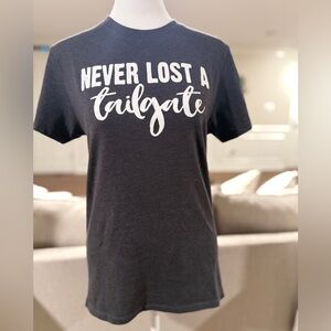 Women’s size small Tee “Never Lost A Tailgate”